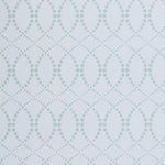 Wallpaper in a playful floral lattice print in aqua blue and tan on a white field.