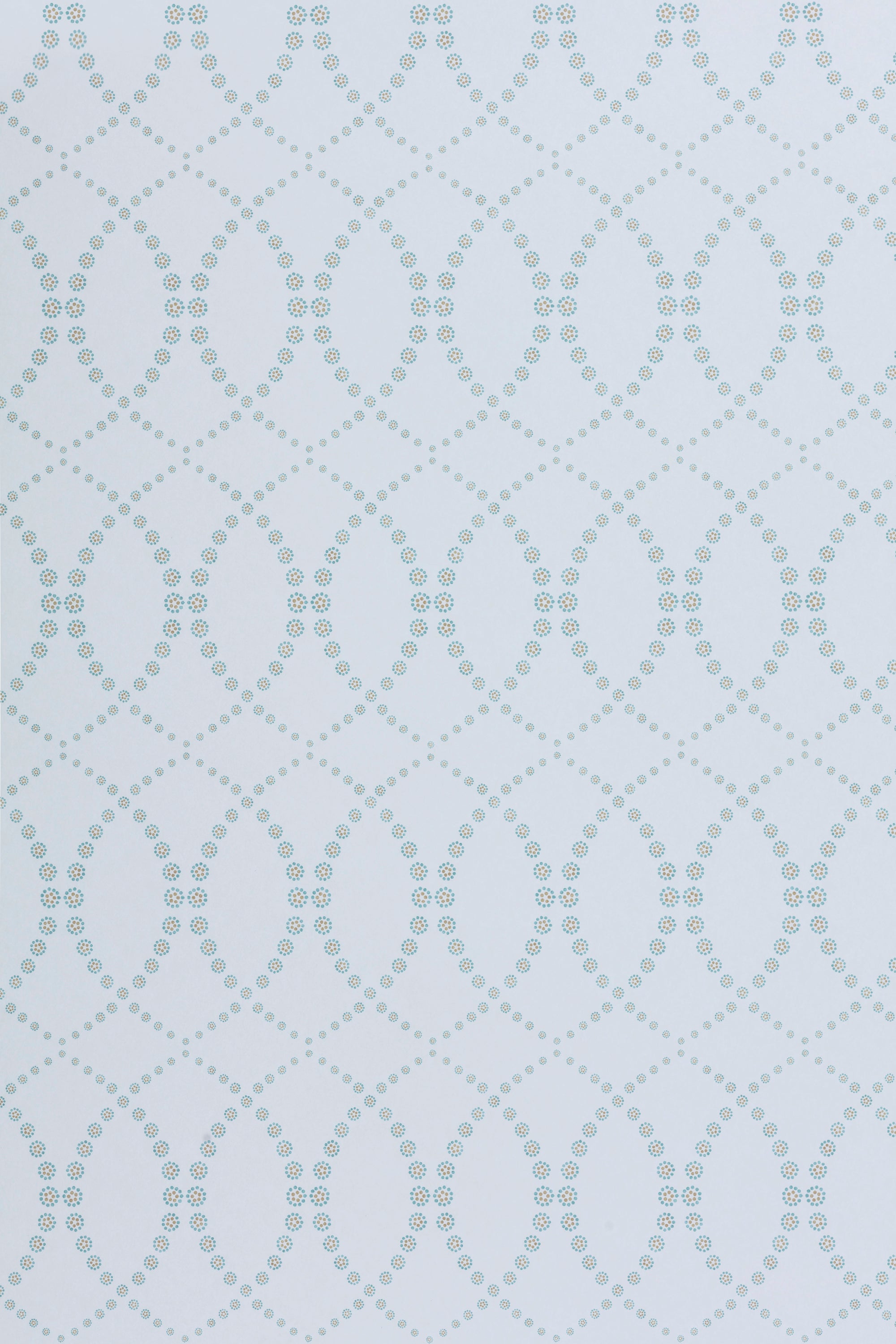 Wallpaper in a playful floral lattice print in aqua blue and tan on a white field.