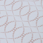 Detail of a wallpaper in a playful floral lattice print in tan and rust red on a white field.
