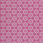 Wallpaper in a floral lattice print in cream on a magenta field.