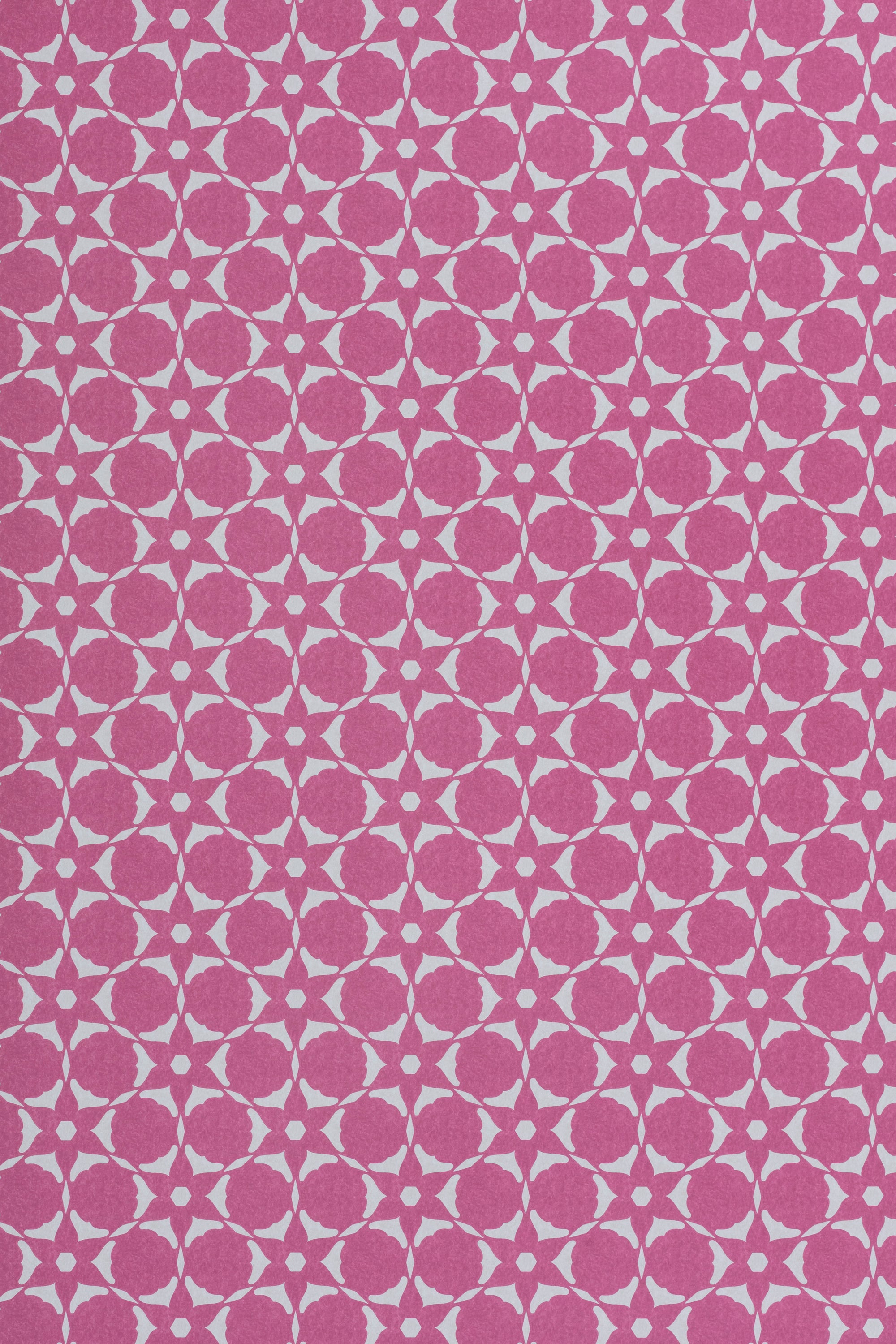 Wallpaper in a floral lattice print in cream on a magenta field.
