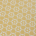 Wallpaper detail in a floral lattice print in  cream on a yellow field