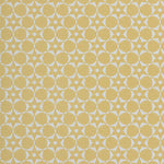 Wallpaper in a floral lattice print in  cream on a yellow field
