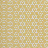 Wallpaper in a floral lattice print in  cream on a yellow field