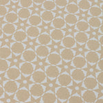 Wallpaper detail in a floral lattice print in cream on a tan field.
