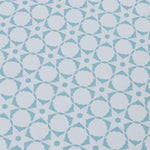 Wallpaper detail in a floral lattice print in powder blue on a cream field