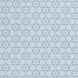 Wallpaper in a floral lattice print in powder blue on a cream field