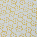 Wallpaper detail in a floral lattice print in  yellow on a cream field