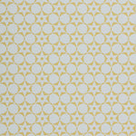 Wallpaper in a floral lattice print in  yellow on a cream field