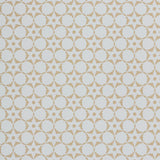 Wallpaper in a floral lattice print in tan on a cream field.