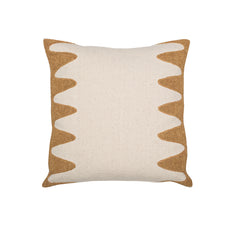 Square cream throw pillow with a wavy raffia embroidery pattern on the sides.