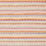 Patterned rug with wavy lines in various colors on a light background