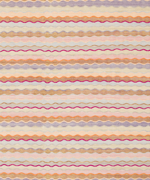 Patterned rug with wavy lines in various colors on a light background