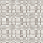 Detail of fabric in a large-scale checked pattern in shades of greige.