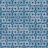 Detail of wallpaper in a gridded damask print in white on a navy field.