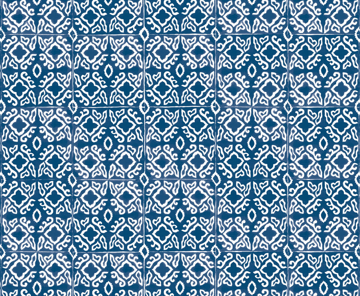 Detail of fabric in a gridded damask print in white on a navy field.