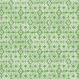 Detail of wallpaper in a gridded damask print in white on a green field.