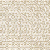 Detail of wallpaper in a gridded damask print in white on a tan field.