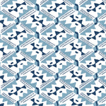 Detail of wallpaper in painterly diamond print in blue and navy on a white field.