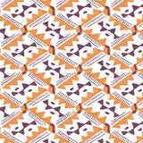 Detail of wallpaper in painterly diamond print in maroon and orange on a white field.