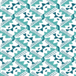 Detail of wallpaper in painterly diamond print in blue and turquoise on a white field.