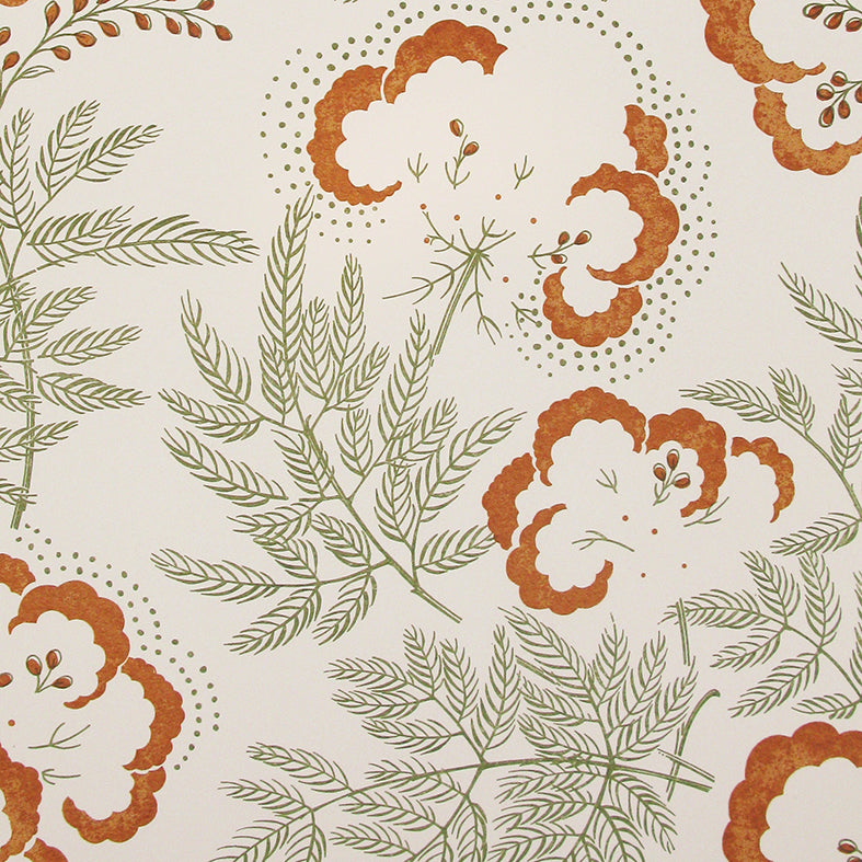 Detail of wallpaper in an intricate floral print in rust orange and sage green on a cream field.