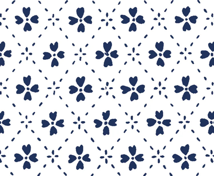 Detail of wallpaper in a dainty floral lattice print in navy on a white field.