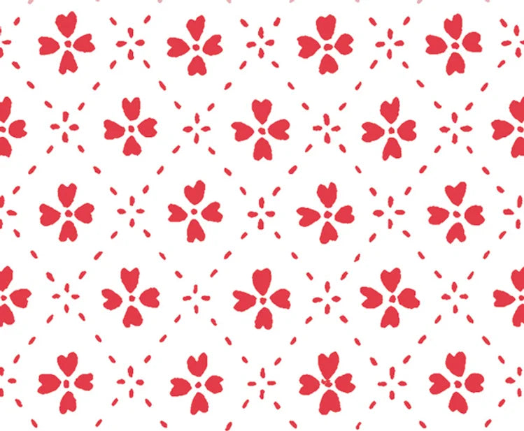 Detail of wallpaper in a dainty floral lattice print in red on a white field.