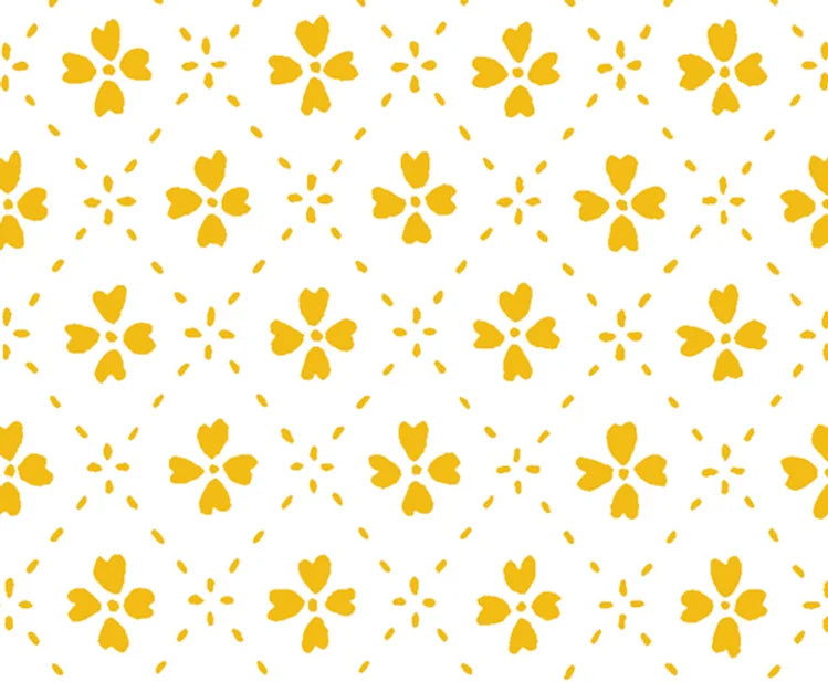 Detail of wallpaper in a dainty floral lattice print in mustard on a white field.