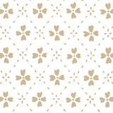 Detail of wallpaper in a dainty floral lattice print in tan on a white field.