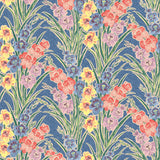 Detail of fabric in a large-scale floral pattern in a rainbow of pastels on a blue field.