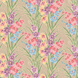 Detail of fabric in a large-scale floral pattern in a rainbow of pastels on a tan field.