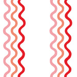 Detail of wallpaper in a wavy stripe print in pink and red on a white field.