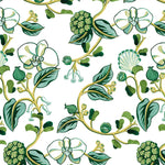 Detail of wallpaper in a varied floral print in shades of green and yellow on a white field.