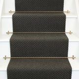 Geometric flatweave runner in green grey on white staircase