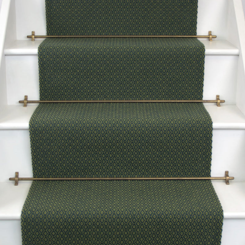 Geometric flatweave runner in green and yellow on white staircase