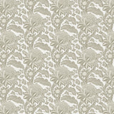 Detail of wallpaper in a repeating botanical print in cream on a white field.