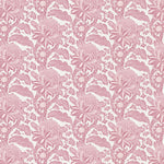 Detail of wallpaper in a repeating botanical print in pink on a white field.