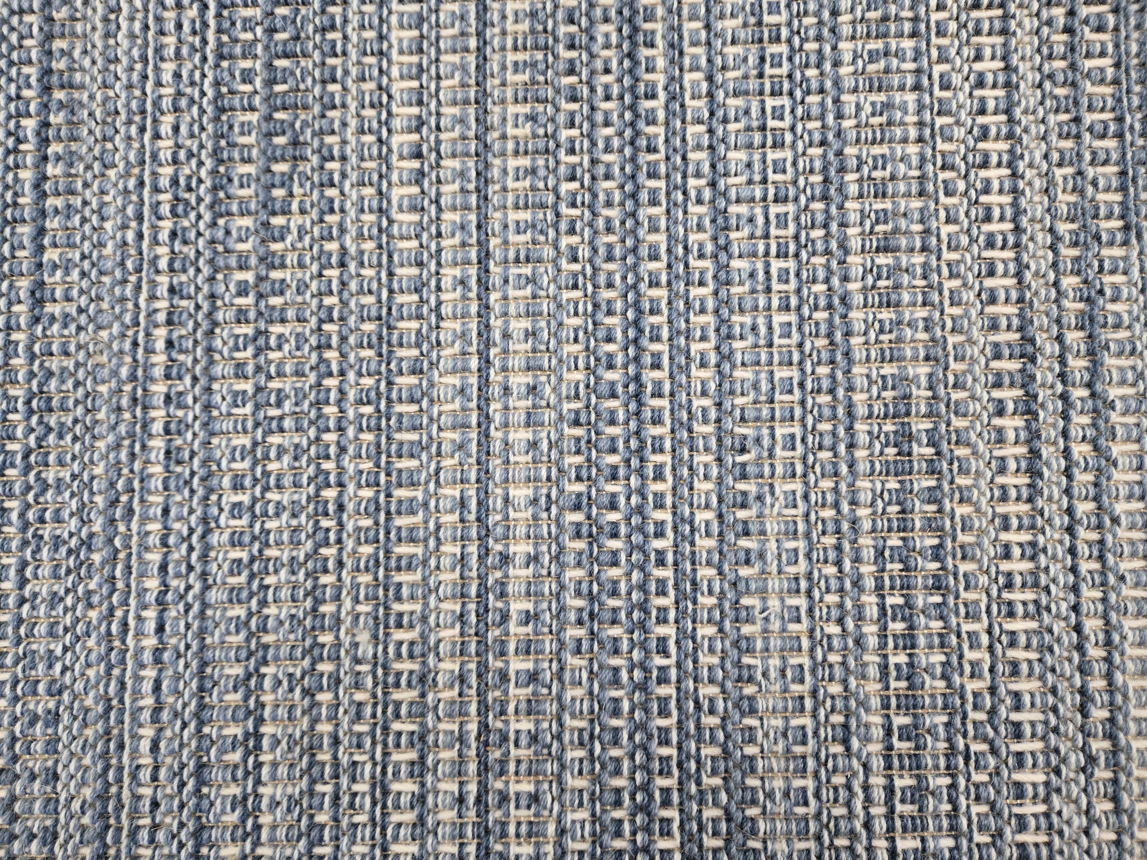 Berlin textural rug design in blue and ivory