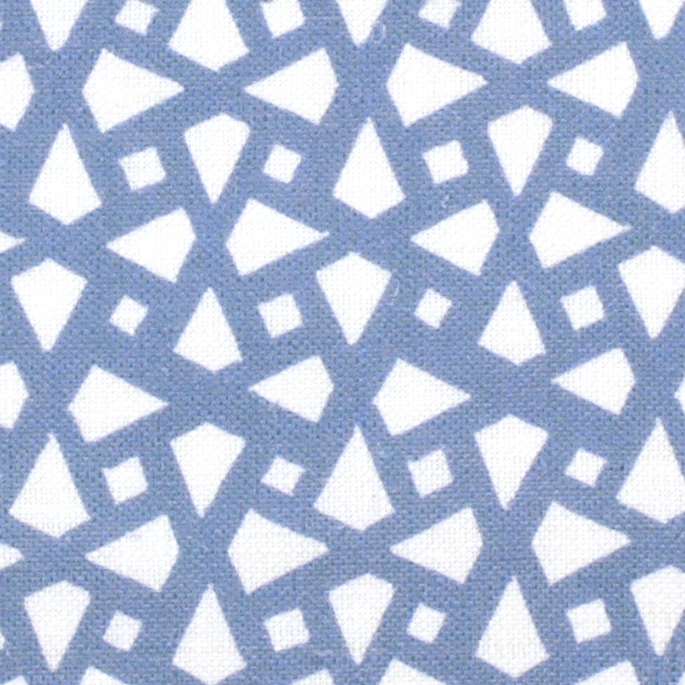 Detail of fabric in a geometric lattice print in blue on a white field.