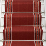 Striped flatweave runner in red on white staircase