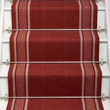 Striped flatweave runner in red on white staircase