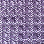 Detail of fabric in a dense leaf print in shades of purple on a purple field.