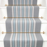 Striped flatweave runner in grey and blue on white staircase