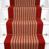 Striped flatweave runner in red and cream on white staircase