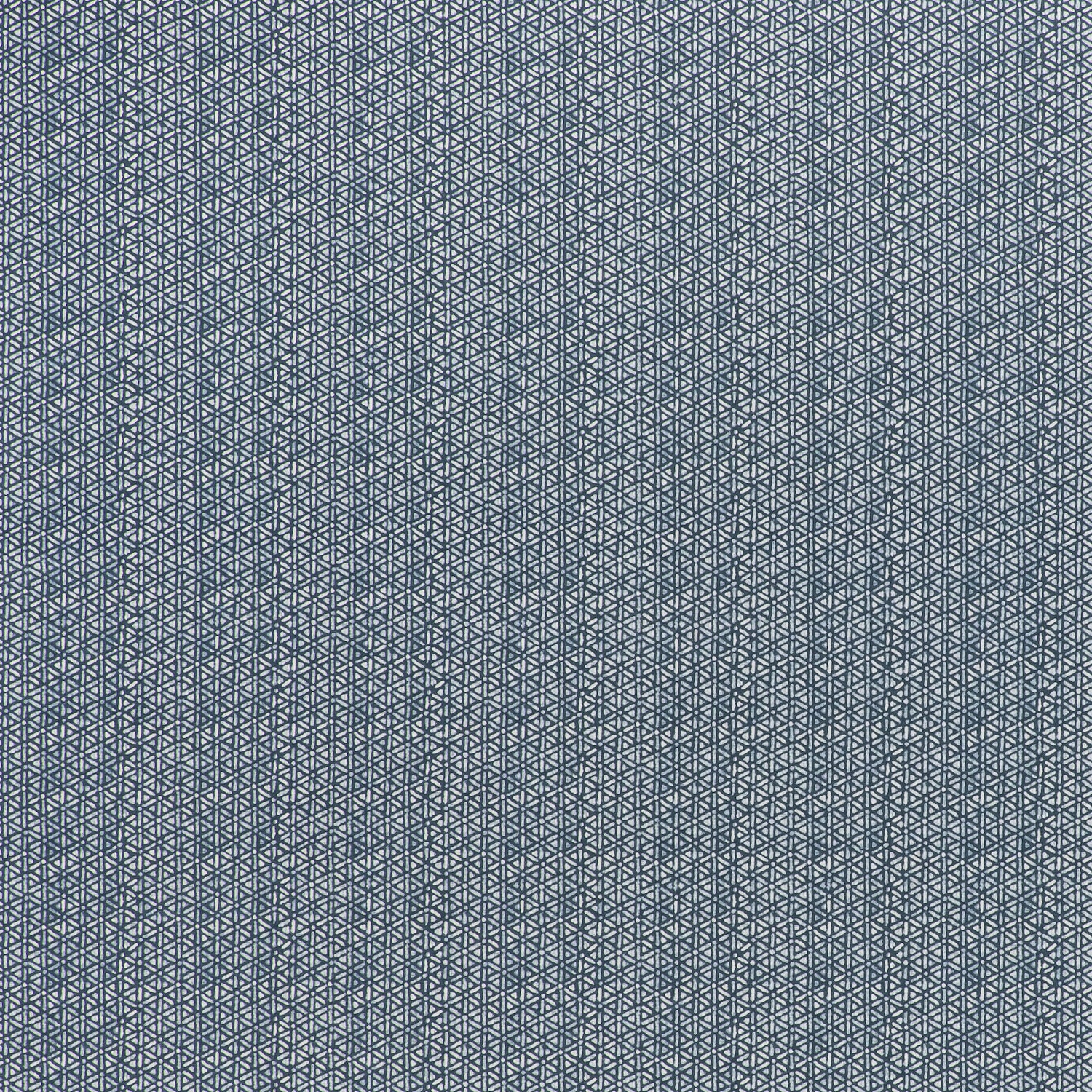 printed linen fabric in a detailed geometric pattern in white on an indigo field.