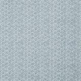 Detail of a linen fabric in a detailed geometric pattern in white on a light blue field.