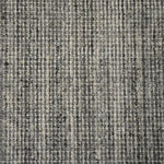 Broadloom carpet swatch in a stripe pattern in a dark grey design