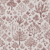 Detail of fabric in a playful animal and tree print in purple on a greige field.