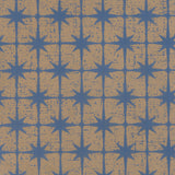 Detail of wallpaper in a geometric damask print in blue on a gold field.